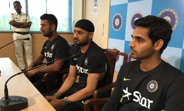 Cheteshwar Pujara (extreme left) with Harbhajan Singh (center) and Bhuvneshwar Kumar before leaving for Bangladesh. Photo courtesy: BCCI Twitter account
