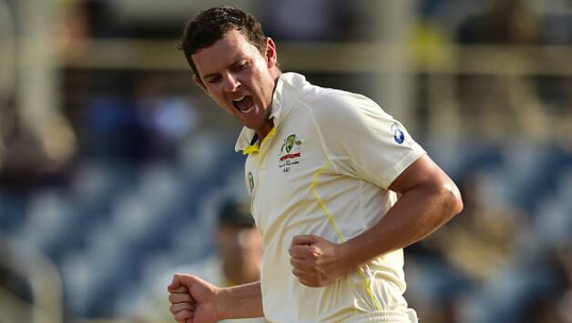 Josh Hazlewood removed the No.10 and No.11 to leave Jason Holder stranded on 82 © Getty Images