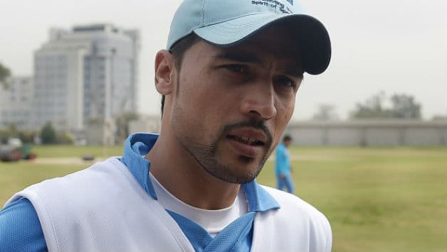  Mohammad Aamer speaks to media representatives at the Army Cricket Ground in Rawalpindi on March 11, 2015 © Getty Images