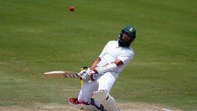 Hashim Amla ducks a short-pitched delivery during his innings of 49 © Getty Images
