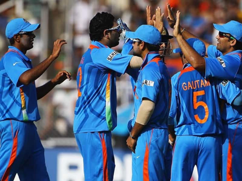 Indian players celebrate a wicket during their World Cup quarter-final match against Australia &Acirc;&copy; Getty Images