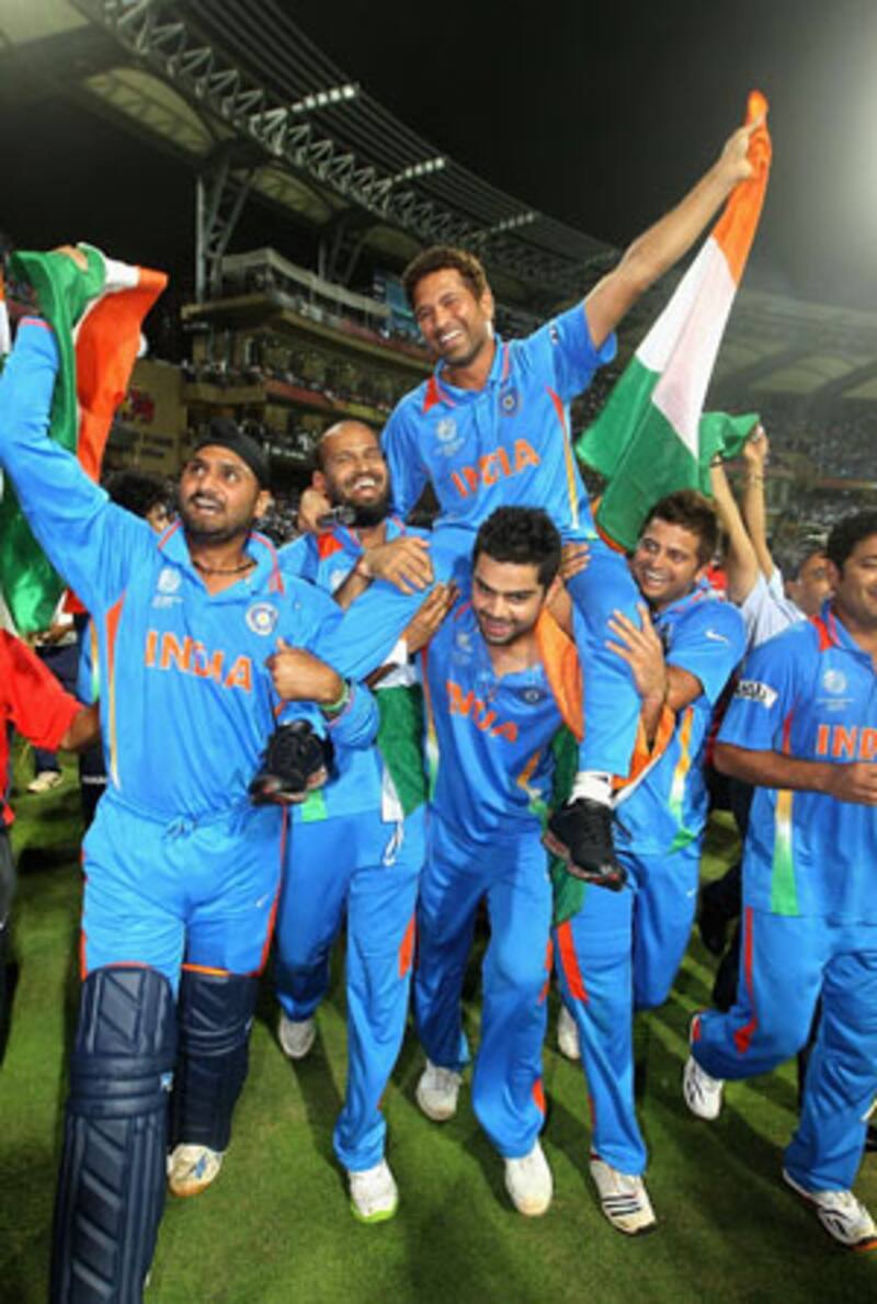 Young Virat Kohli carries Sachin Tendulkar on his shoulders during the lap of honour after India&Atilde;&cent; s epic win over Sri Lanka in the World Cup final &Acirc;&copy; Getty Images