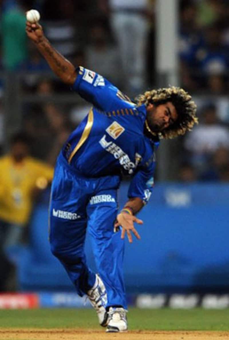 Mumbai Indians fast bowler Lasith Malinga bowls during their IPL match against Pune Warriors India at the Wankhede Stadium in Mumbai &Acirc;&copy; AFP