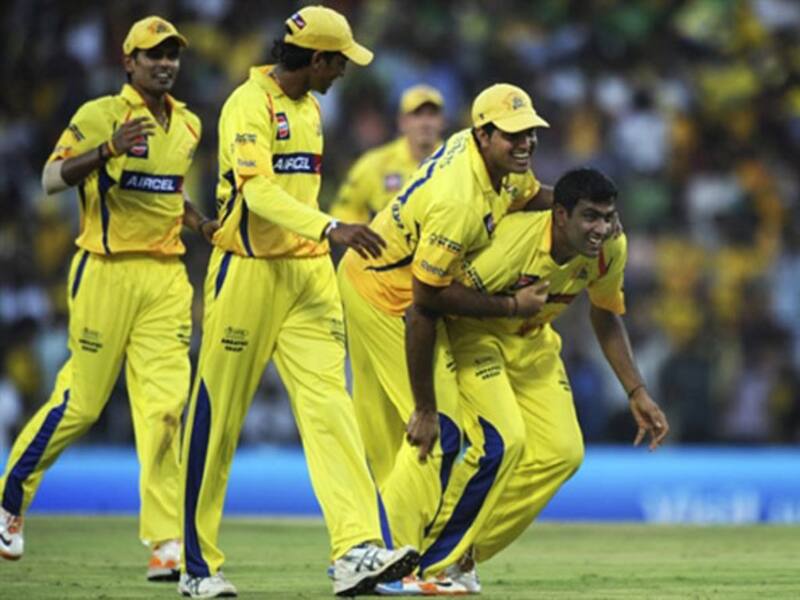 Chennai players celebrate the fall of a wicket in a league match &Acirc;&copy; AFP