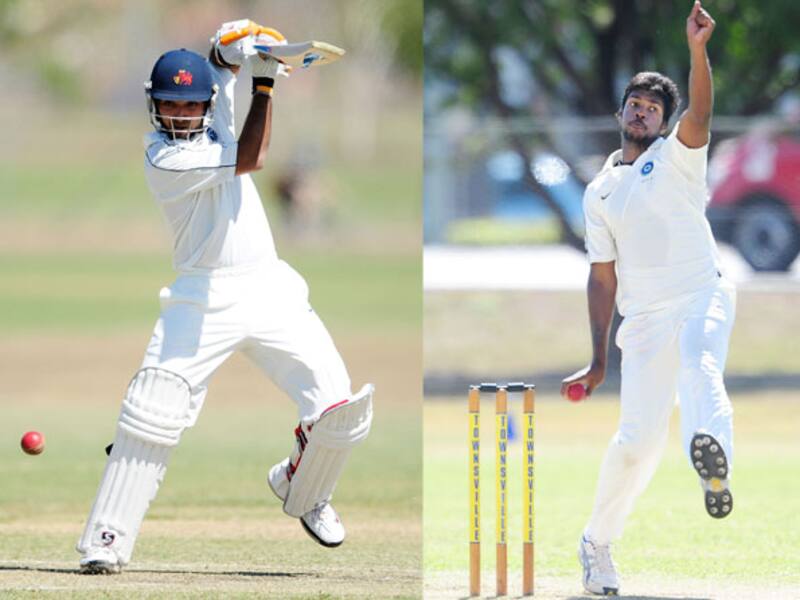 Ajinkya Rahane (left) and Varun Aaron &copy; Getty Images.