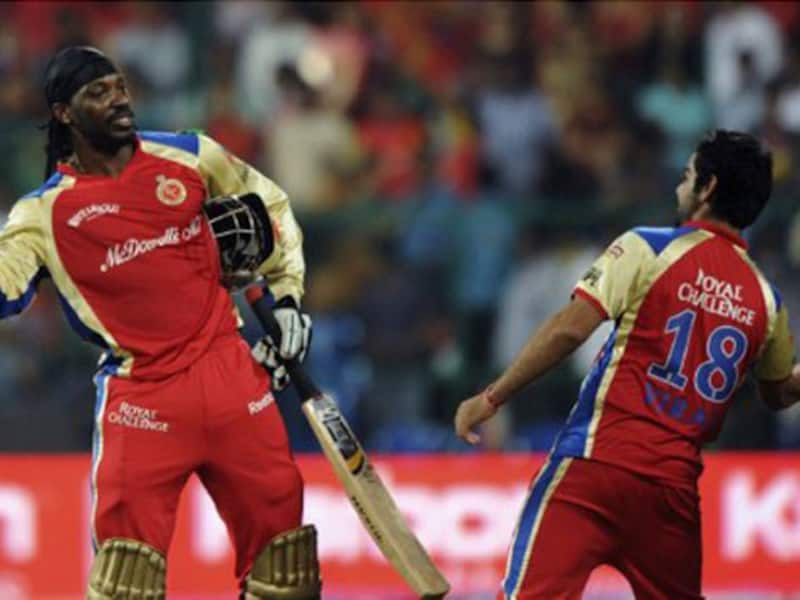 If Chris Gayle (left) is the fire for attacking, then Virat Kohli will be the ice for anchoring the innings &copy; AFP