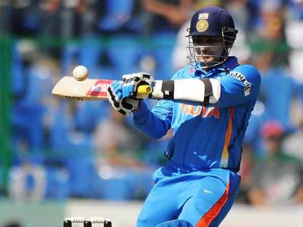 Indian opening batsman Virender Sehwag scored record-breaking 219 runs off 149 balls against West Indies © AFP