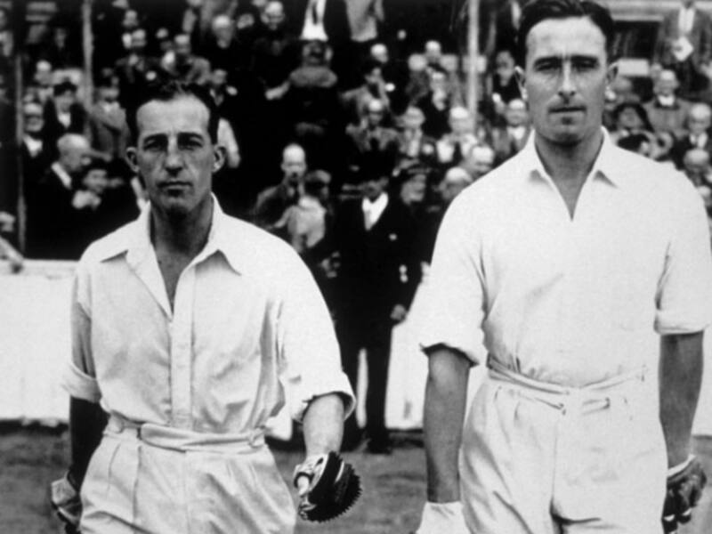 Bill Edrich (left) and Denis Compton walk out to bat in the match &copy; Getty Images