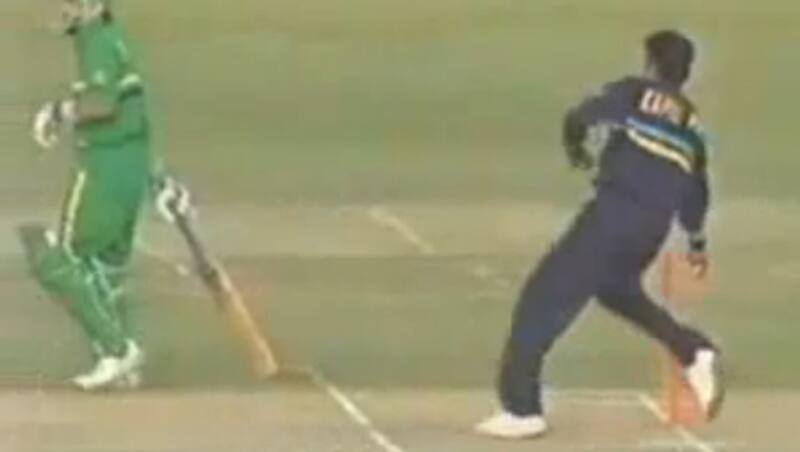A video grab showing Kapil Dev (right) flicking off the bails as Peter Kirsten backs up