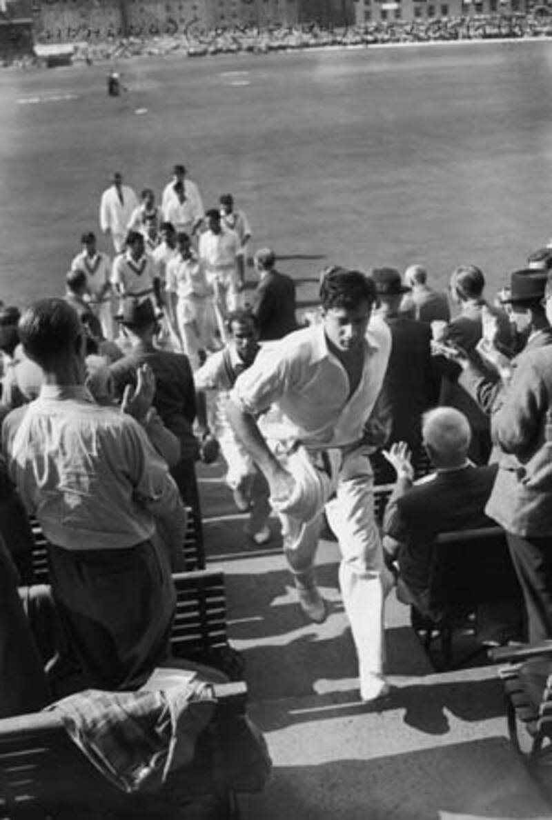 Fazal Mahmood returns to the pavilion during the England-Pakistan Oval Test in 1954, where he took 6 wickets in each innings to help his team win by 24 runs &Acirc;&copy; Getty Images