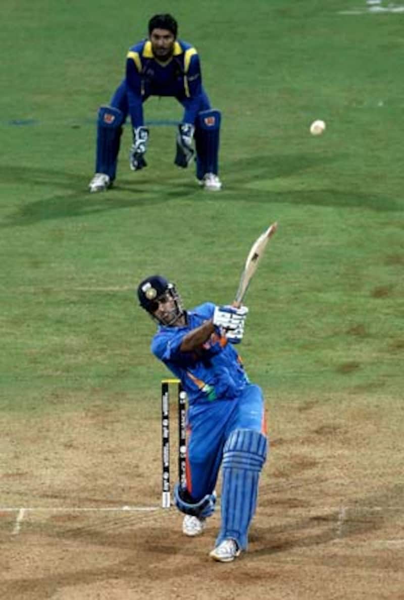 Sealing it with a six: MS Dhoni launches Nuwan Kulasekara into the orbit to mastermind India's triumph in the World Cup final &Acirc;&copy; Getty Images