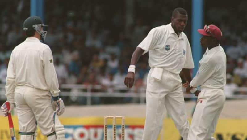 Richie Richardson (right) dragging the giant figure Curtly Ambrose (centre) from strangulating Steve Waugh (left) to death after one of the ugliest on-field confrontations ever seen on a cricket field &Acirc;&copy; Getty Images