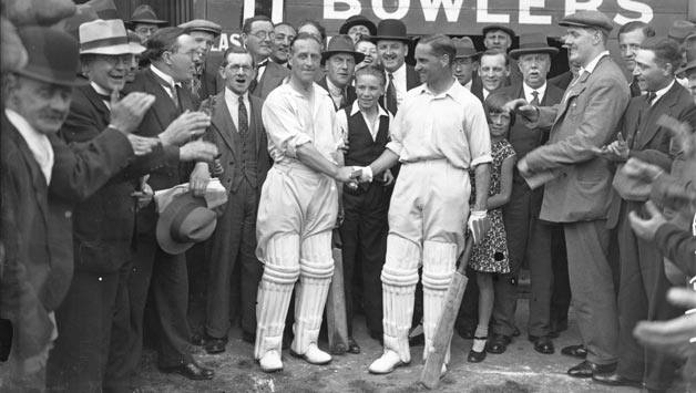 Percy Holmes (left) and Herbert Sutcliffe after breaking the record for first wicket stand © Getty Images