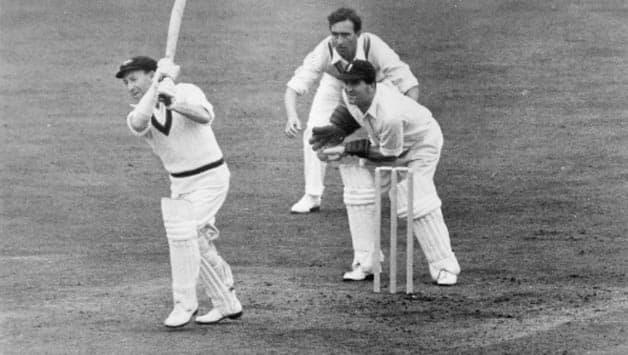 Lindsay Hassett batting at The Oval. Denis Compton is fielding at first slip and Godfrey Evans is the wicketkeeper © Getty Images