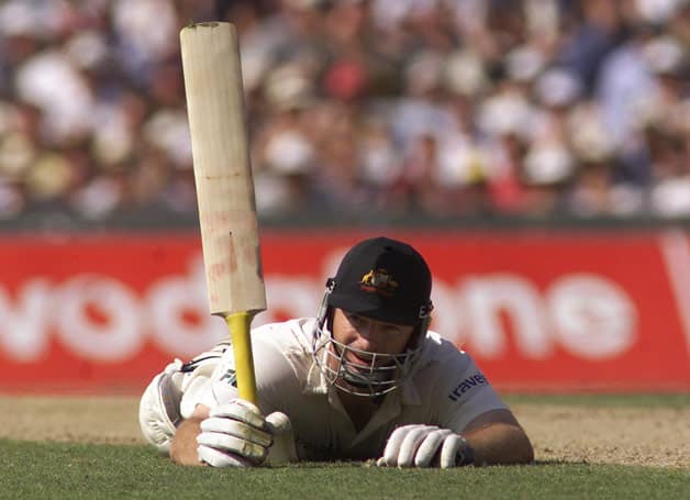 Steve Waugh makes a desperate but successful dive to complete his hundred on Day Two © Getty Images