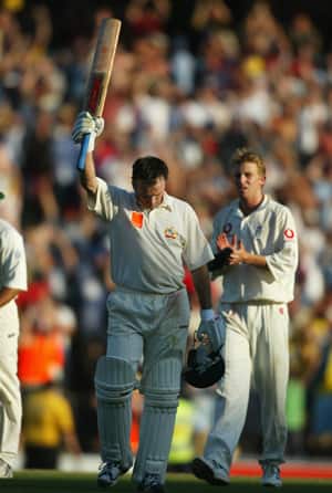 Steve Waugh raises his bat after reaching 29th Test ton © Getty Images