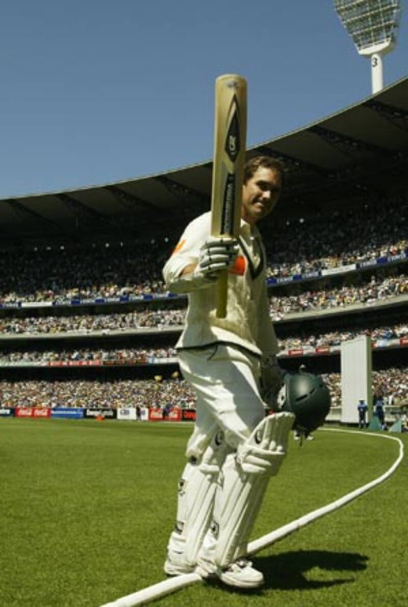 Justin Langer acknowledges the crowd. His 250-run innings lasted for 578 minutes and 407 balls, one that included 30 boundaries and a six &Acirc;&copy; Getty Images