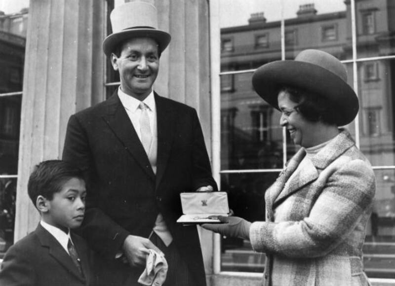 Basil D'Oliveira with wife Naomi and son Damian at Buckingham Palace where he has just been presented with an OBE by the Queen. Damian went on to to play for Worcestershire, as did Damian's son Brett &copy; Getty Images