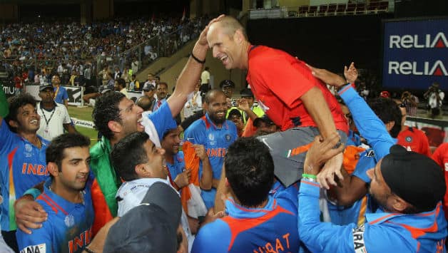 Gary Kirsten, the low-key coach of the 2011 World Cup-winning Indian team, chaired during the victory lap © Getty Images