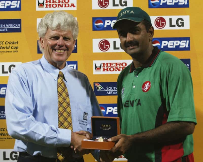 Aasif Karim (right) receives the Man of the Match award from Barry Richards after the Super Six match between Kenya and Australia in 2003 World Cup &Acirc;&copy; Getty Images