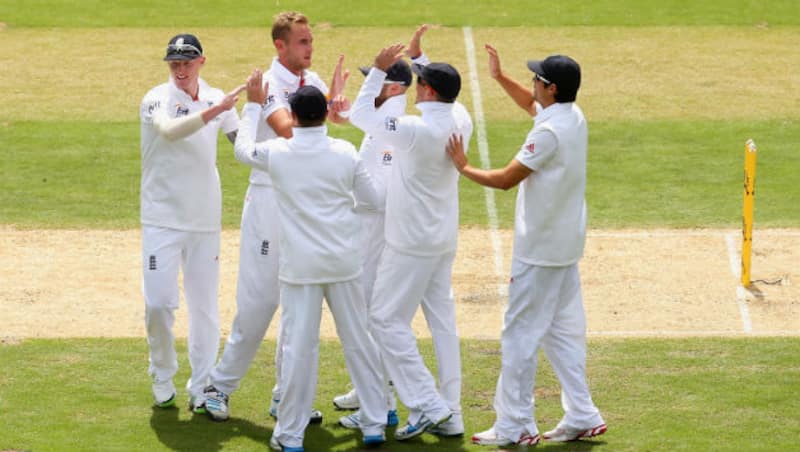 England players celebrate the wicket of David Warner (not in photo) on Day One of the second Ashes 2013-14 Test &Acirc;&copy; Getty Images