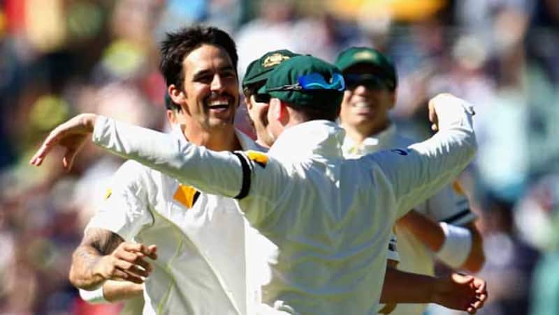 Mitchell Johnson celebrates the wicket of Alastair Cook (not in photo) &copy; Getty Images