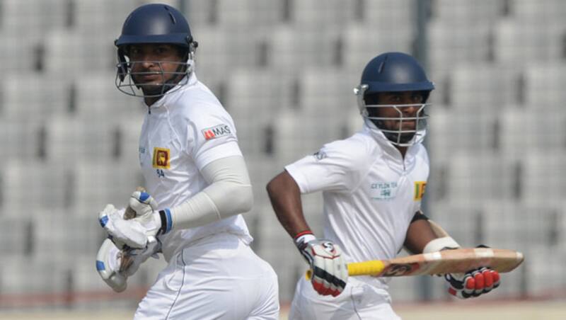 Kumar Sangakkara (left) and Kaushal Silva made merry of Bangladesh's bowling on Day Two &Acirc;&copy; AFP