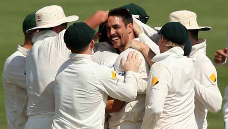 Mitchell Johnson (center) registered the third best figures by an Australian in South Africa &copy; Getty Images