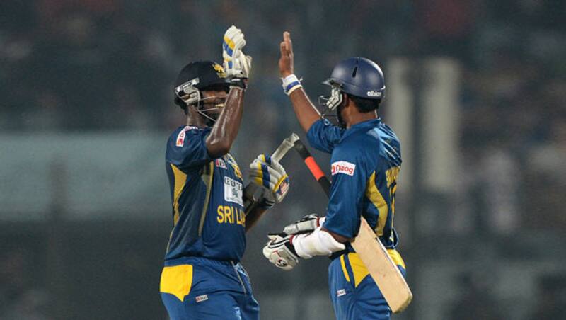 Thisara Perera (left) and Sachitra Senanayake were the starts of Sri Lanka's 1st ODI win &copy; AFP
