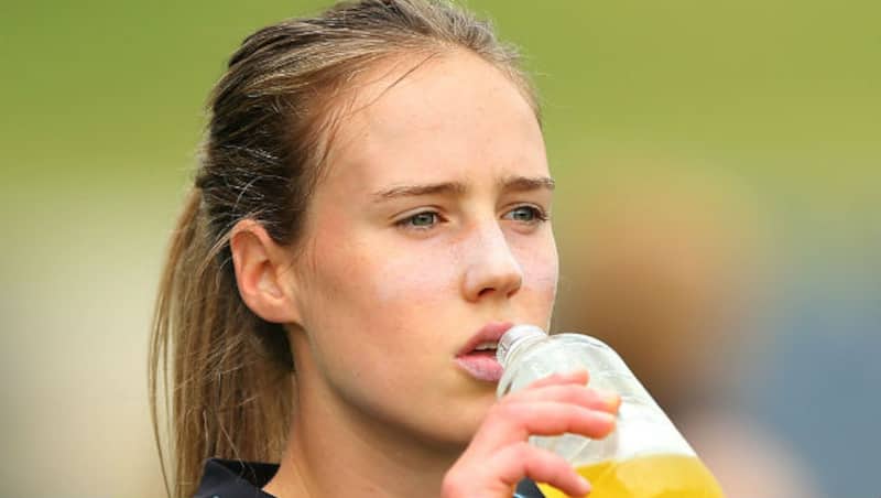 Ellyse Perry of Sydney drinks during warm up prior to the round