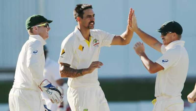 Mitchell-Johnson-(C)-of-Australia-celebrates-after-he-got-the-wicket-of-AB-de-Villie