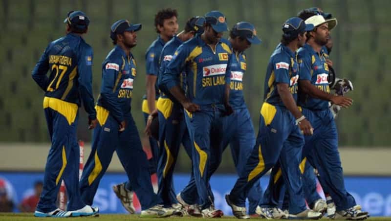 Sri-Lankan-cricketers-walk-back-to-the-dressing-room-after-winning-the-seventh-match-of-the-Asia-Cup-one-day-cricket-tournament-between-Sri-Lanka-and-Afghanistan
