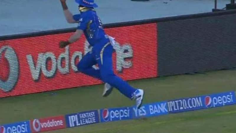 Pollard tosses the ball up in the air while he crosses over the boundary line.