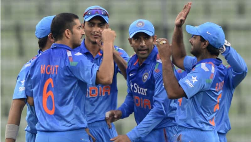 Indian cricketers celebrating a wicket &Acirc;&copy; AFP