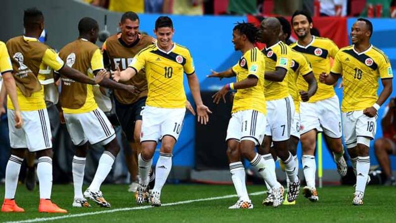 James Rodriguez (jersey No 10) scored the first goal for Columbia &copy; Getty Images