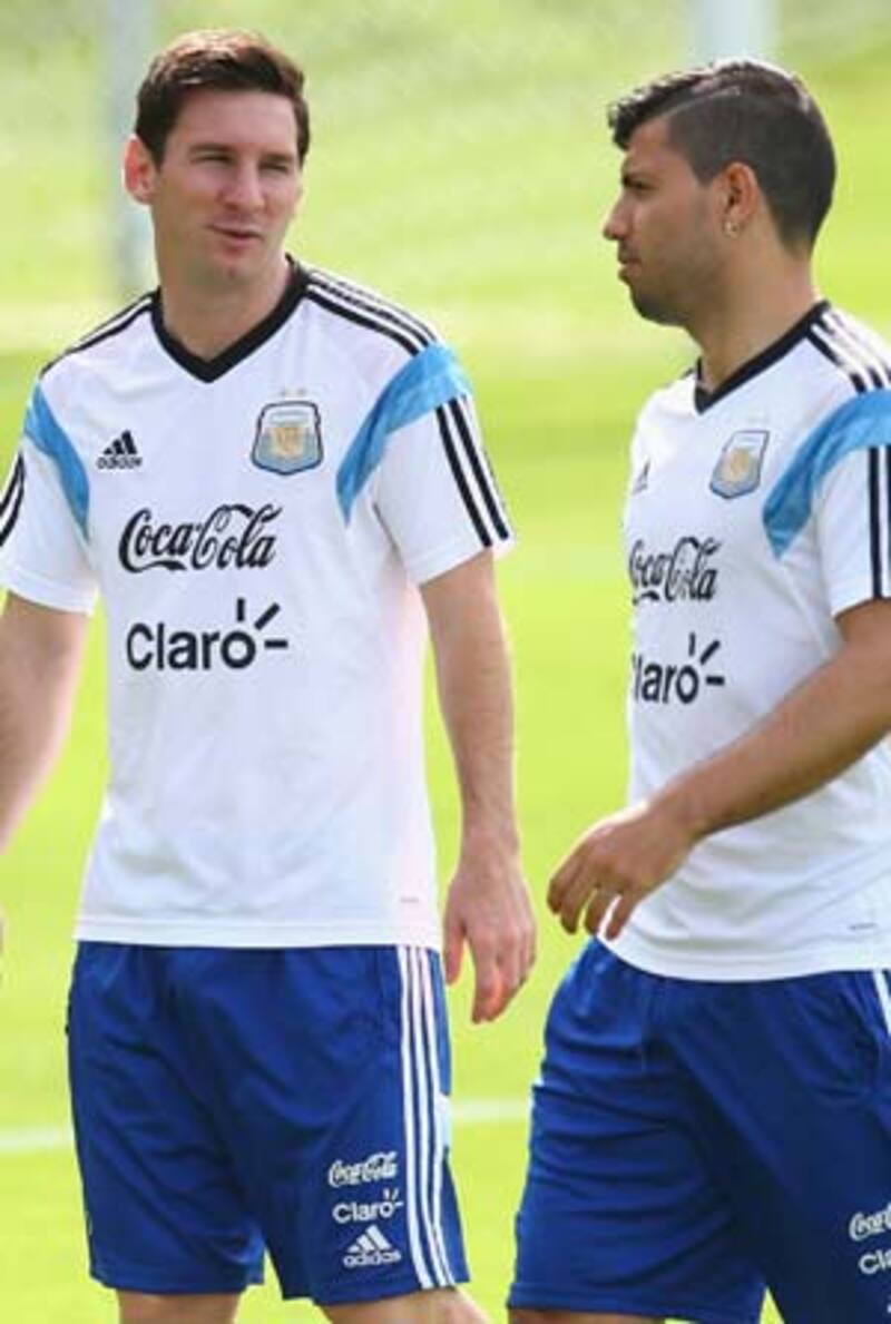 Lionel Messi (left) wants to play in an Argentina team which includes Sergio Aguero (right) and Gonzalo Higuain &copy; Getty Images