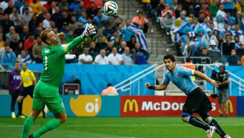 Luis Suarez (right) scores Uruguay's second goal against England &copy; Getty Images