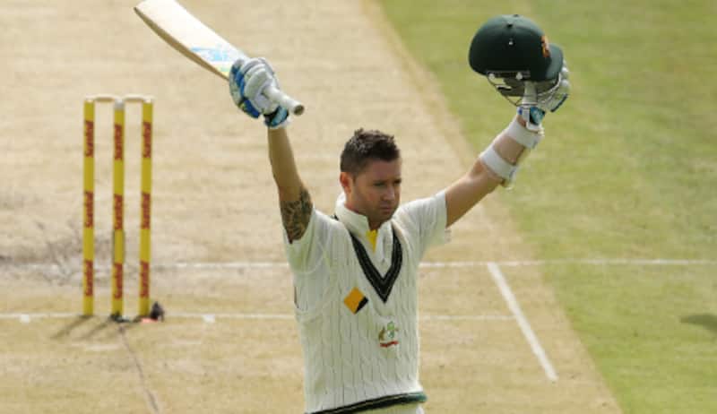 Michael Clarke celebrates his century after showing warrior-like spirit to withstand the barrage of bouncers from Morne Morkel at Cape Town &copy; Getty Images