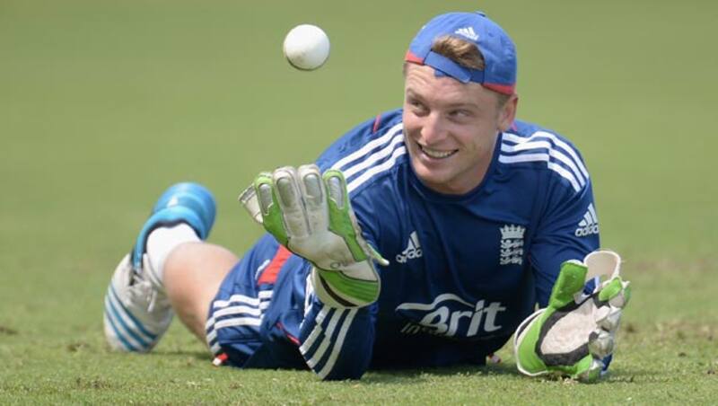 Jos-Buttler-of-England-takes-part-in-a-wicketkeeping-drill-during-a-nets-session-at-Sir-Viv-Richards-Cricke