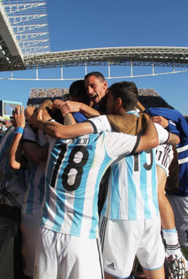 Argentina celebrate their victory against Switzerland &copy; Getty Images