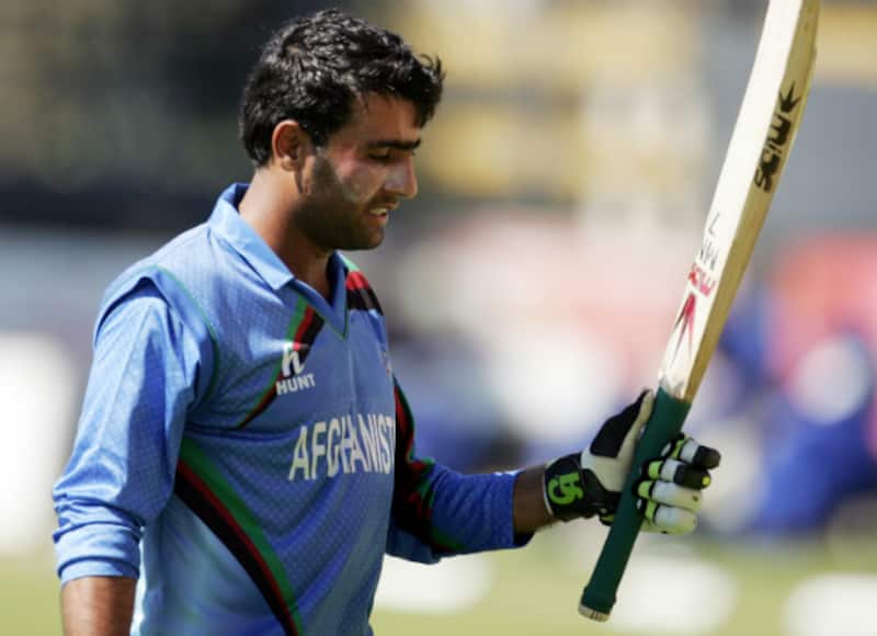 Usman Ghani celebrates his century against Zimbabwe in the second ODI at Bulawayo &copy; AFP