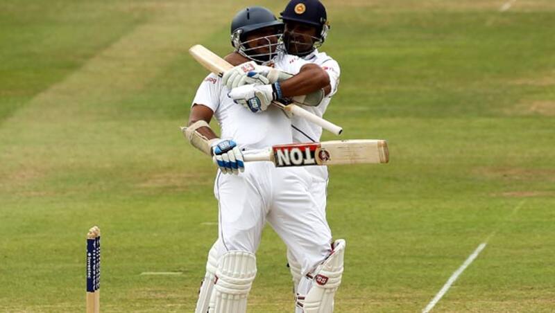 Kumar Sangakkara celebrating his hundred with Mahela Jayawardena &Acirc;&copy; Getty Images 