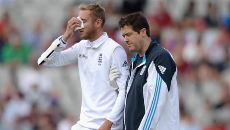 Stuart Broad (left) was hit by a nasty bouncer which went through his helmet © Getty Images