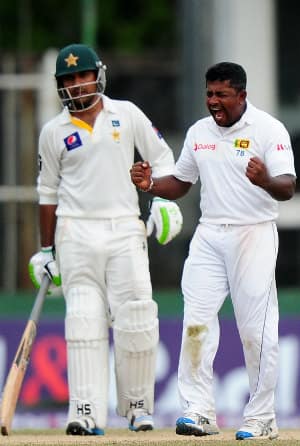 Rangana Herath picked nine for 127 to become the first left-arm bowler to bag nine wickets in an innings © AFP