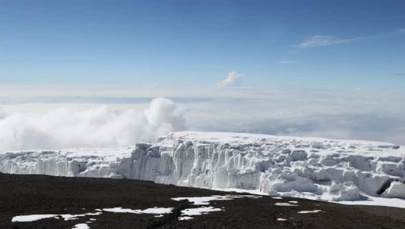 A new world record was set on s cricket was played on Mount Kilimanjao ( in picture) &Acirc;&copy; Getty Images 