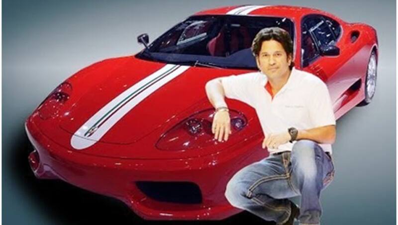 Sachin Tendulkar and the red beauty. 
