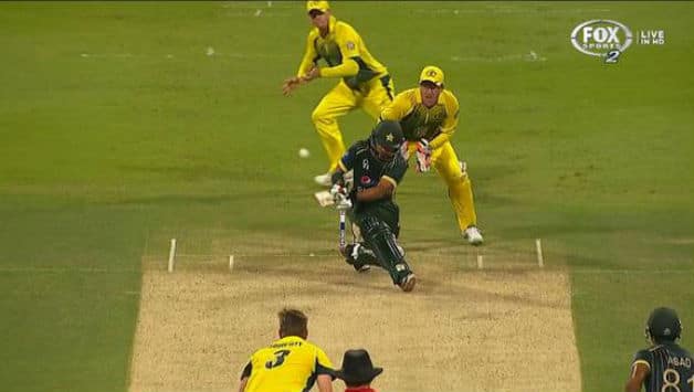 Fawad Alam has played the sweep and Steven Smith has one foot on the leg-side, getting ready to take the catch.