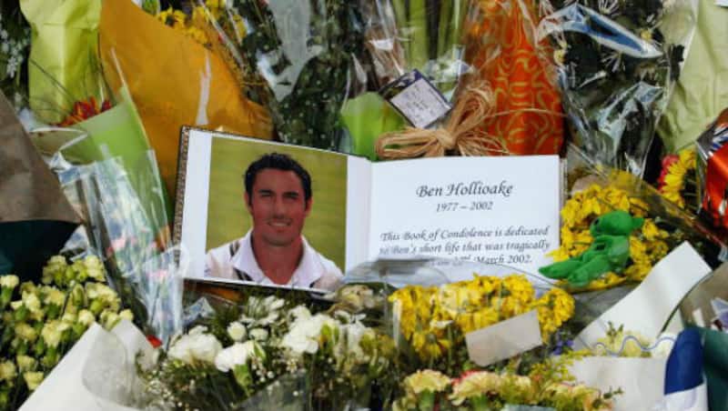 Book of condolence and flowers for Ben Hollioake&rsquo;s memorial service &copy; Getty Images 