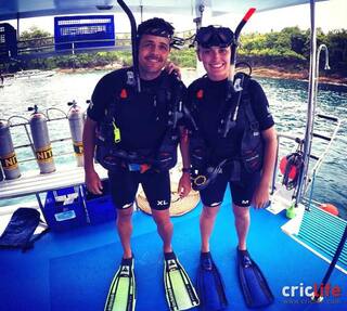 Jacques Rudolph and his wife get set for scuba diving