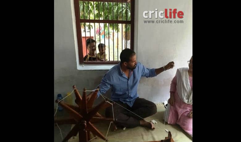 Yusuf Pathan spinning yarn at Gandhi Ashram